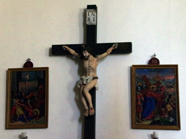 a crucifix hangs from the wall of a church