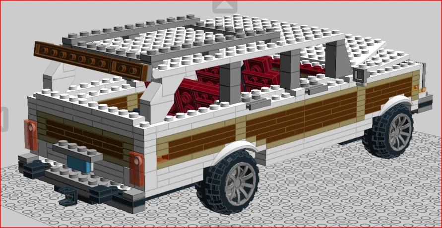 a white and brown lego truck with a red roof