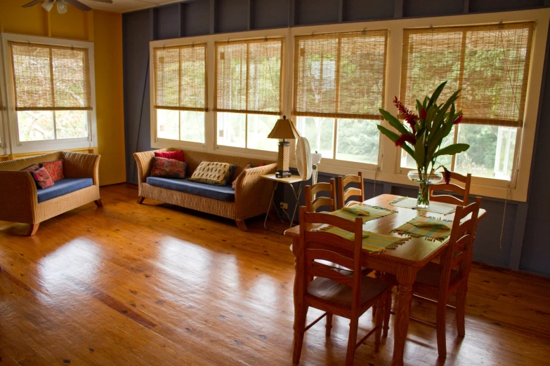 the living room is furnished with wooden furniture