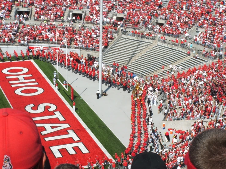 the red football stands near a large group of fans