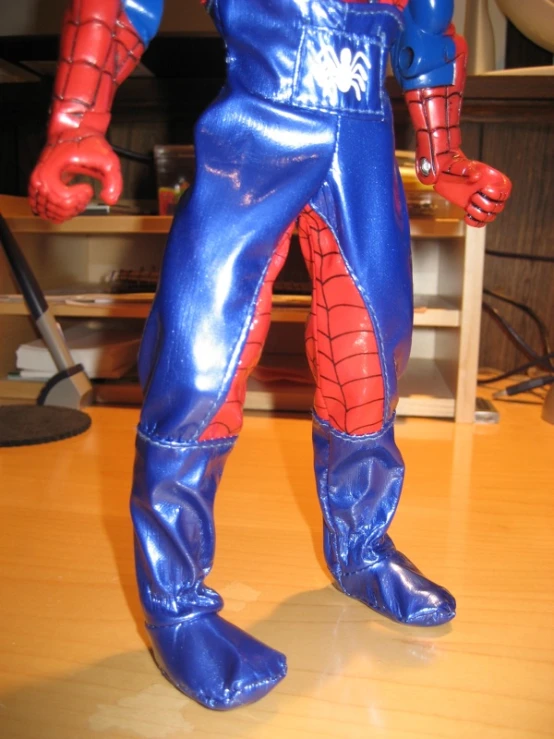 a close up of the legs and feet of a plastic toy