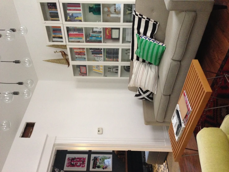 a couch with many books on top of it