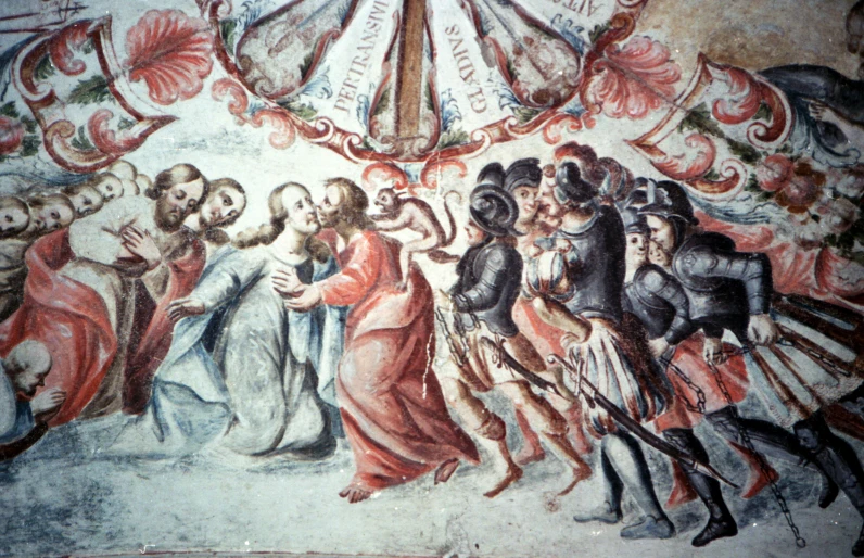 a painting on the side of a building depicting jesus and others