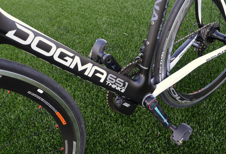 two bikes parked on top of green grass