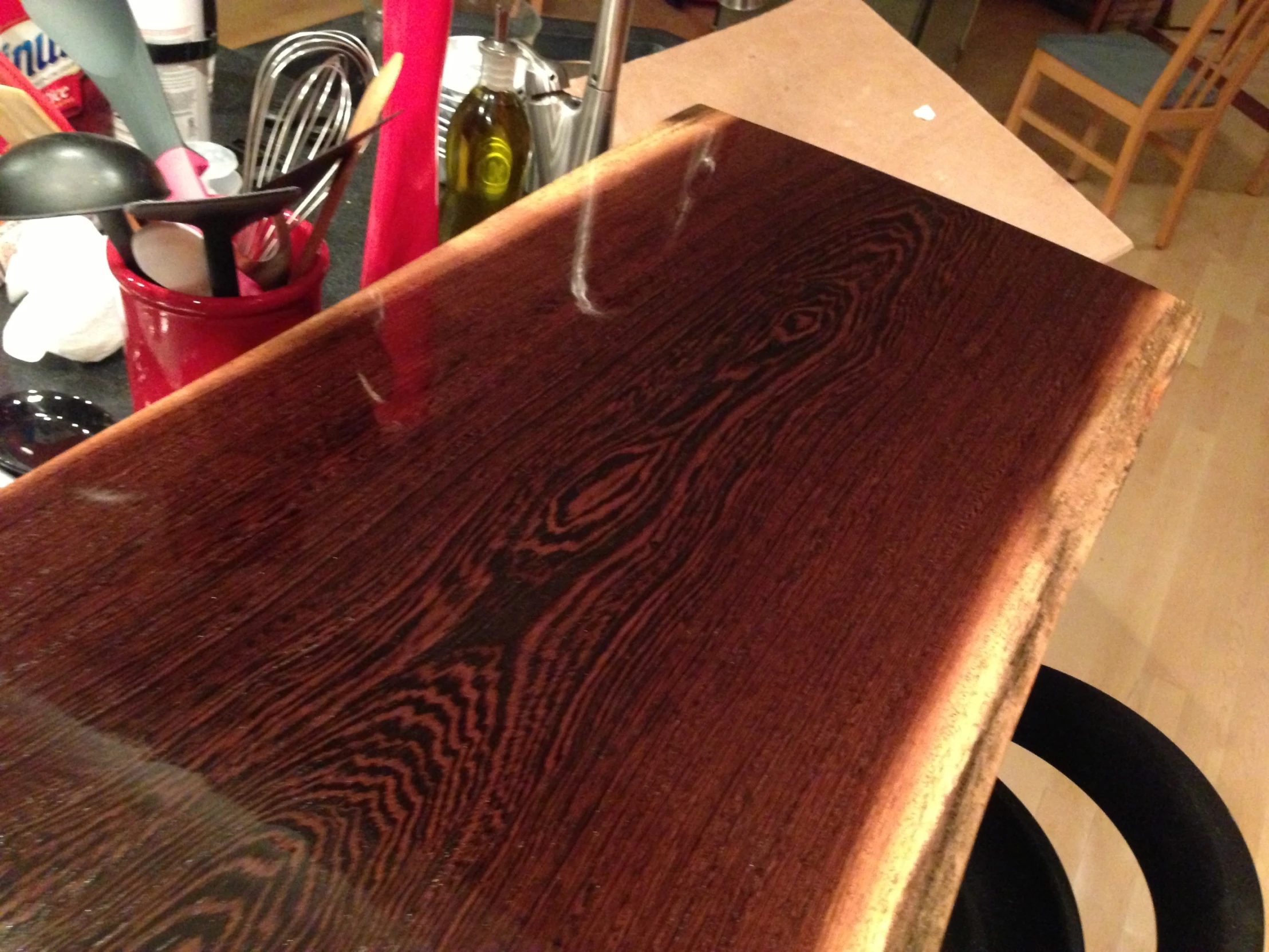 a wooden table with an attached piece of brown wood