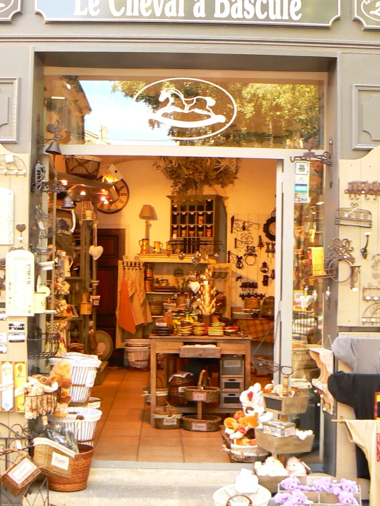 the entrance of a shop filled with lots of goods