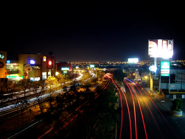 night time s of a city street with city lights