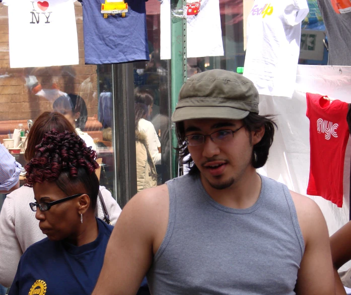 two young men walking around in the city