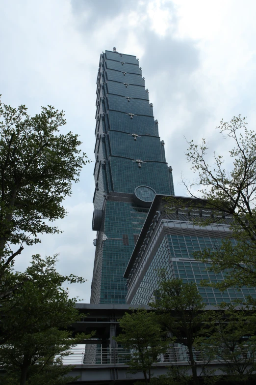 looking up at the building with clock tower on it's side