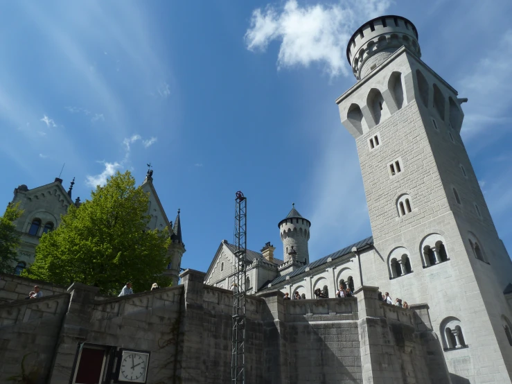 there is a large stone building with towers and windows