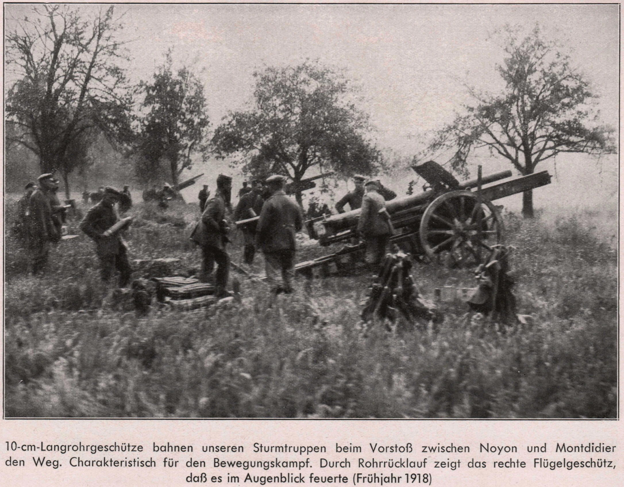 an old po of a large group of men fighting with two artillery guns