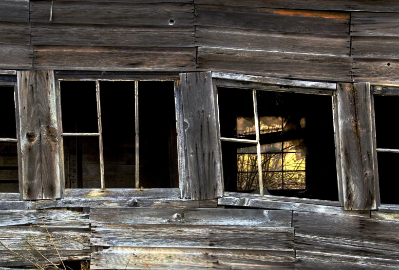 looking out an old rustic wooden window frame