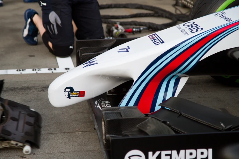 the front end of a car lying on the ground