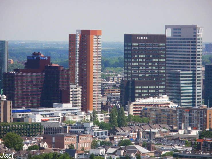 a city with high rise buildings and lots of greenery