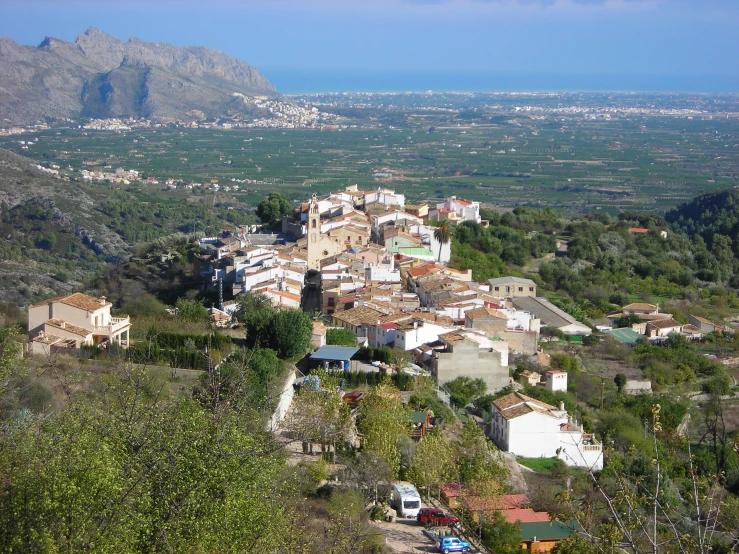 the town sits atop the hill overlooking a valley