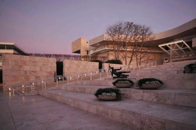 a stone stairs leading up to some buildings