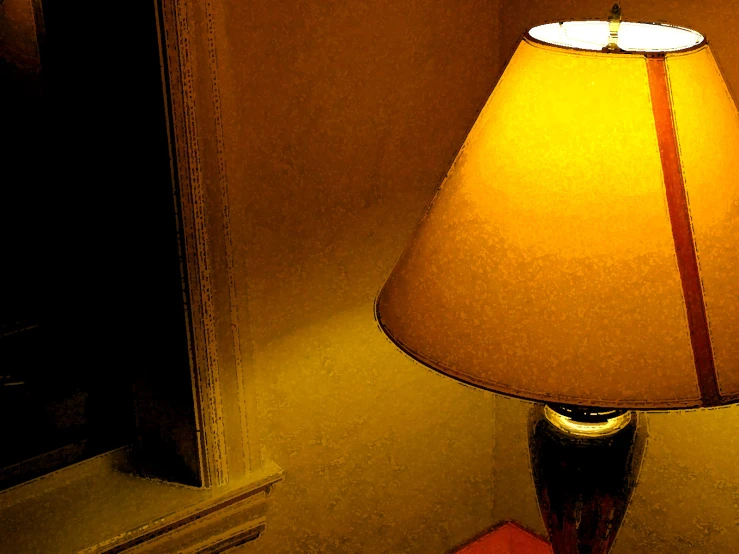 a lamp that is on inside of a room