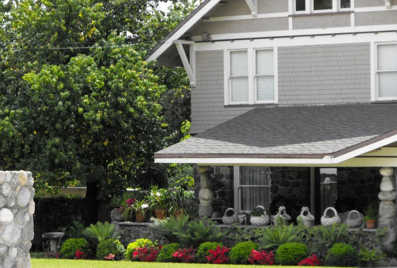 a home with a garden in front of it