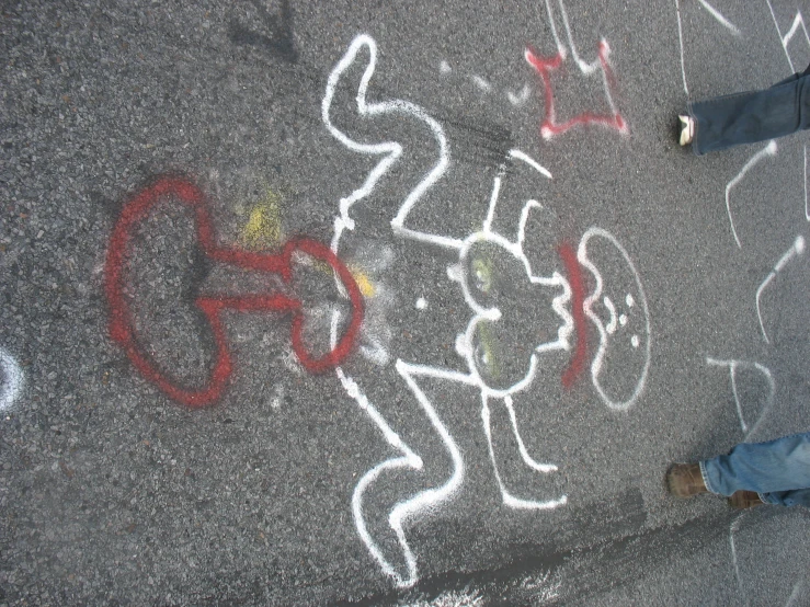 this chalk - covered sidewalk has been created to be for children to draw