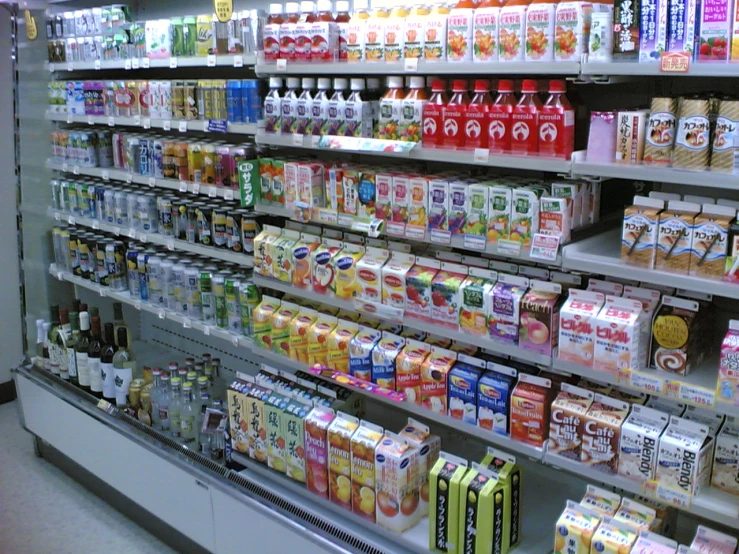 a display in a grocery store filled with dairy and other products
