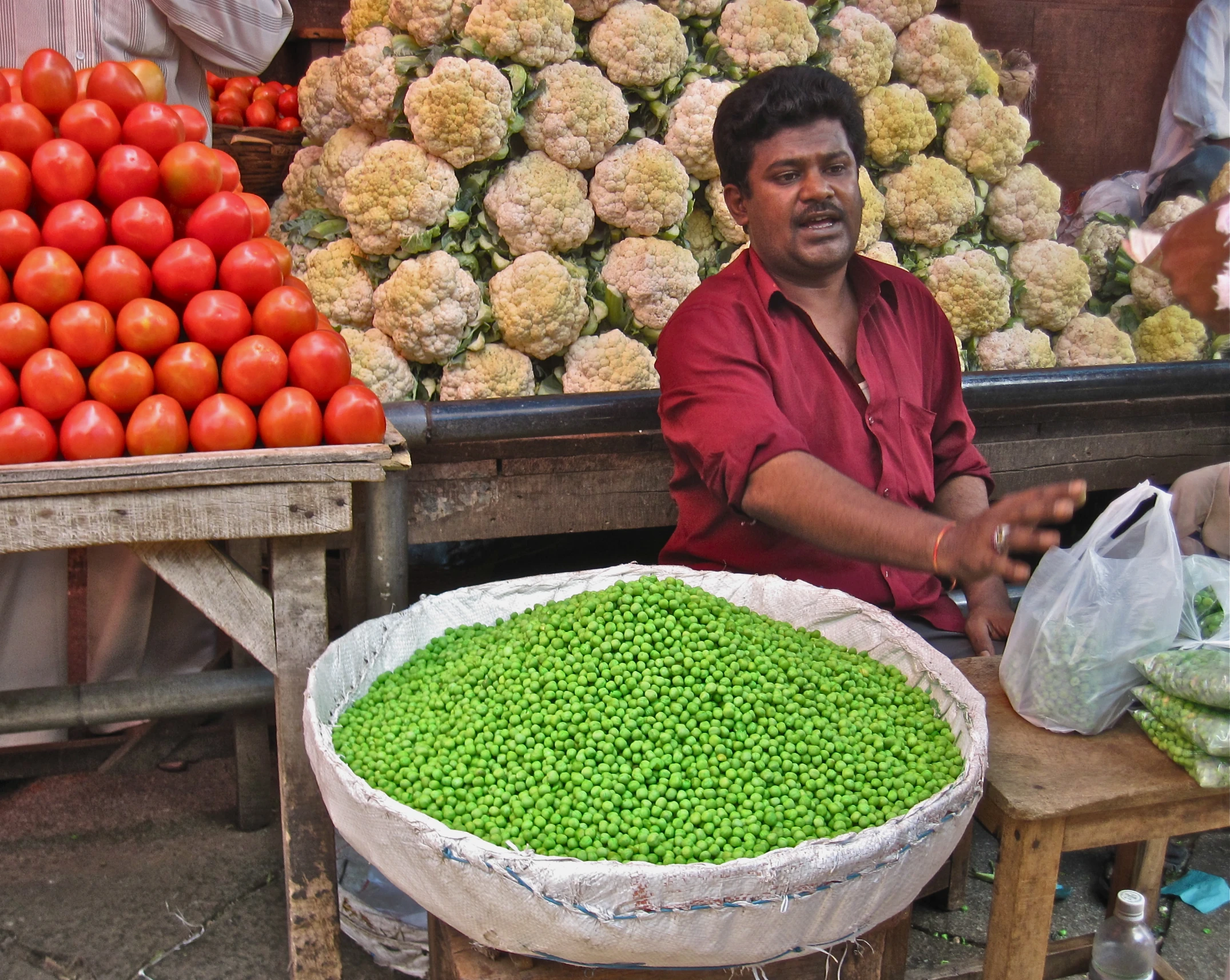 a person standing in front of a green bowl