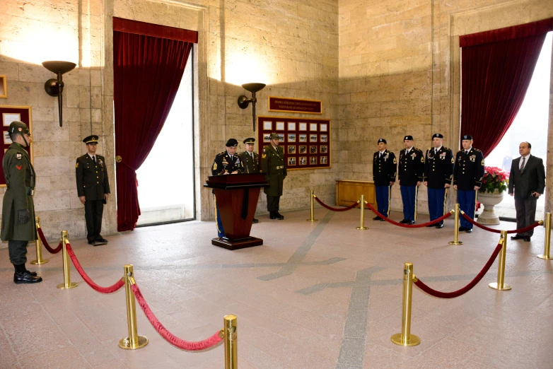 military officers standing in the entrance to a ceremony