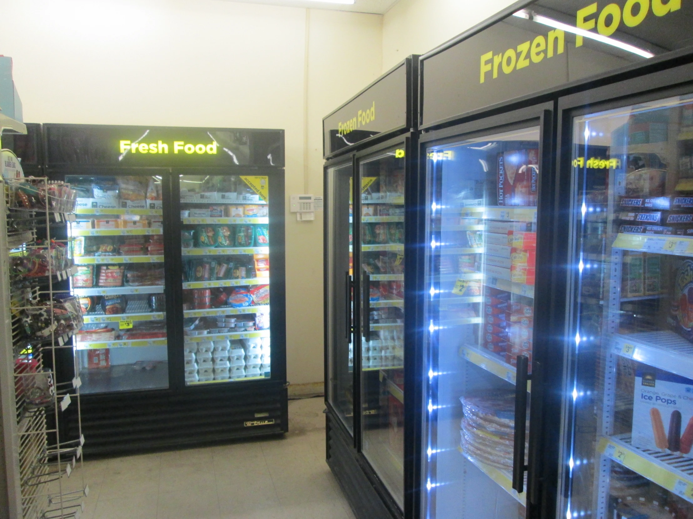 a grocery store with a selection of frozen food