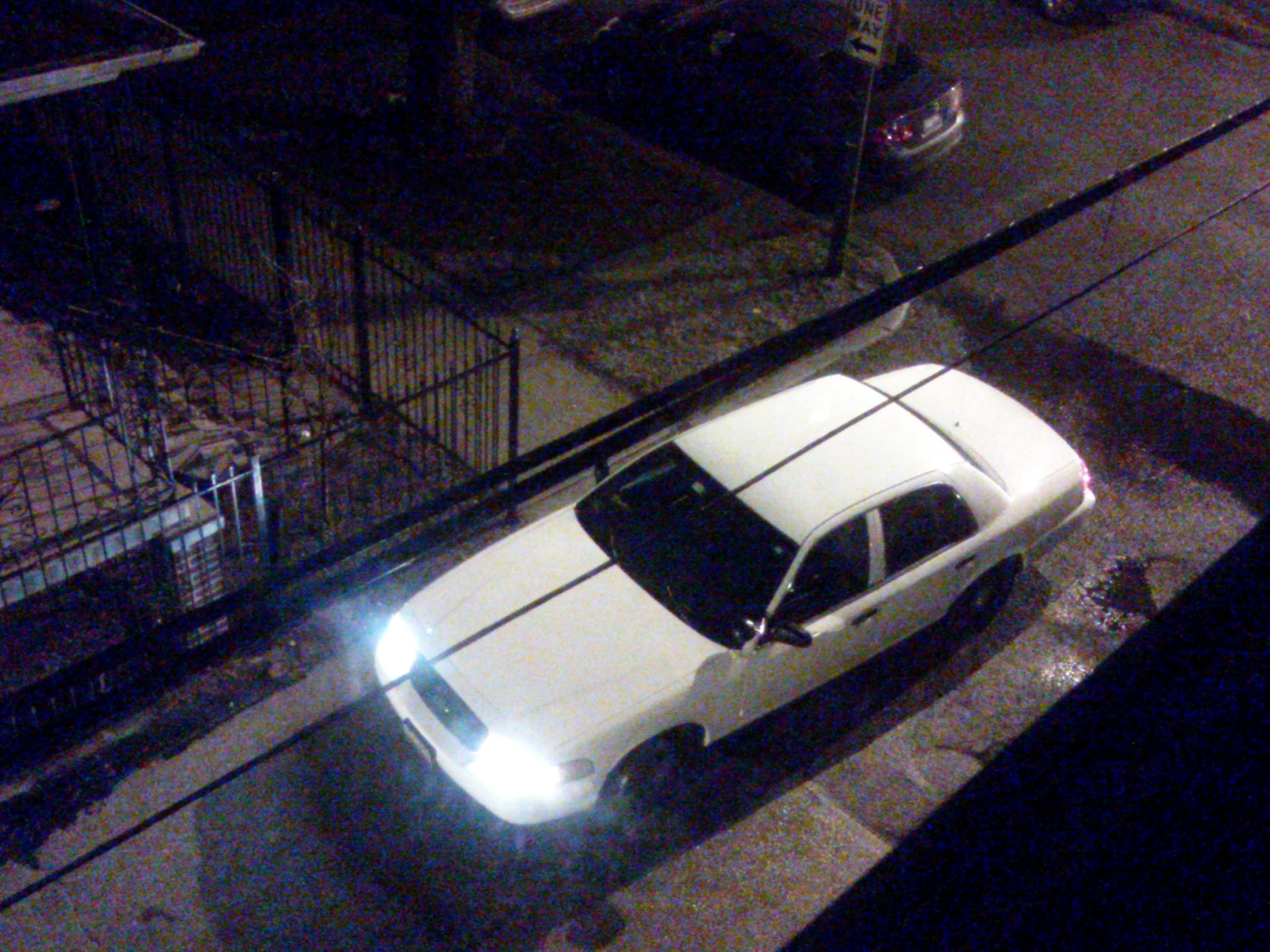 a police car parked on the side of the street