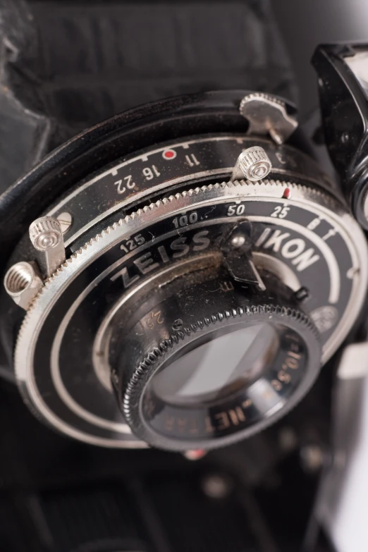 some type of analog watch with its hands on
