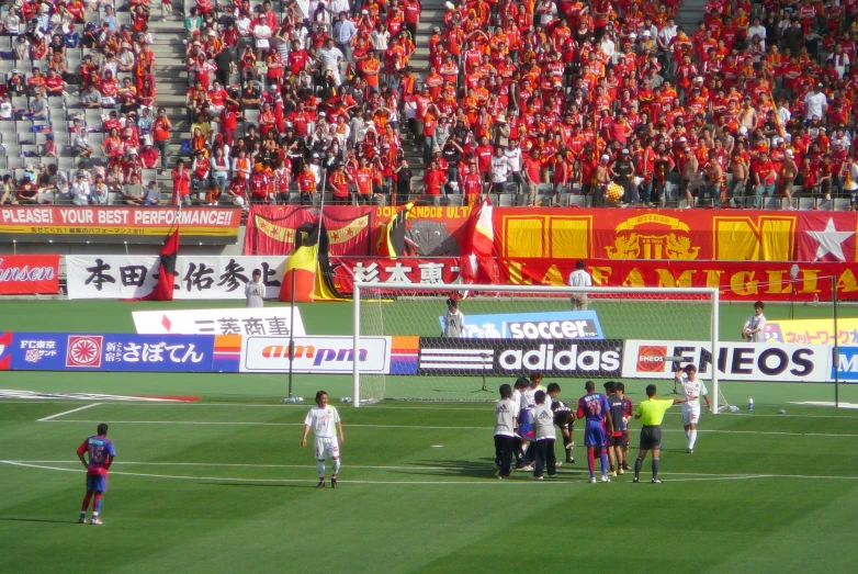 the soccer match is played on a soccer field