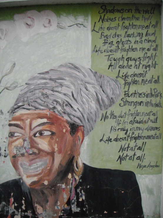 a painting on a wall of a woman wearing a hat