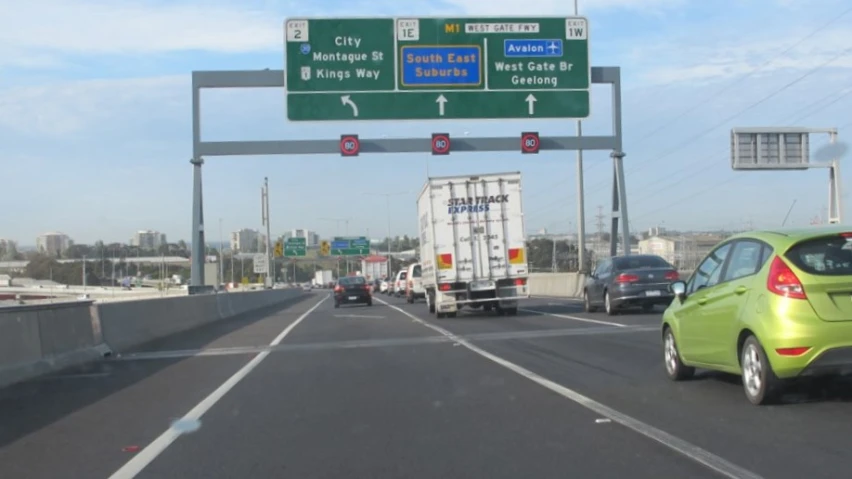 vehicles driving on the highway as seen from the inside