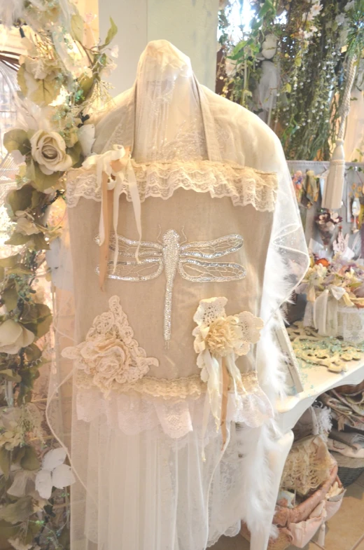 a collection of vintage wedding garters in a shop window