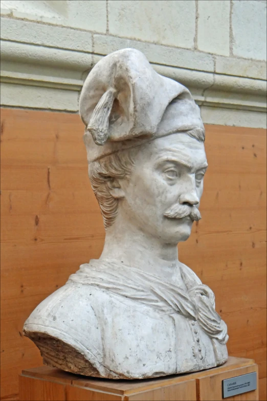 a sculpture of a man with a turban on his head