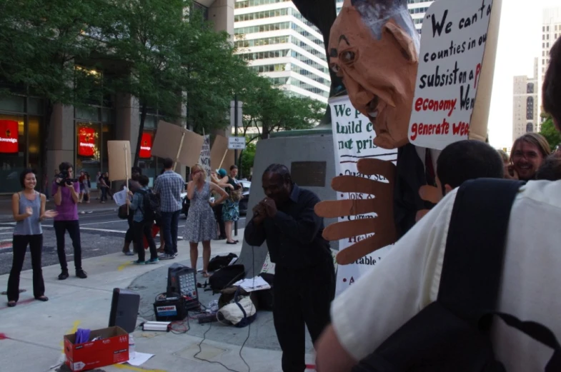 a group of people on the street protesting against their guns