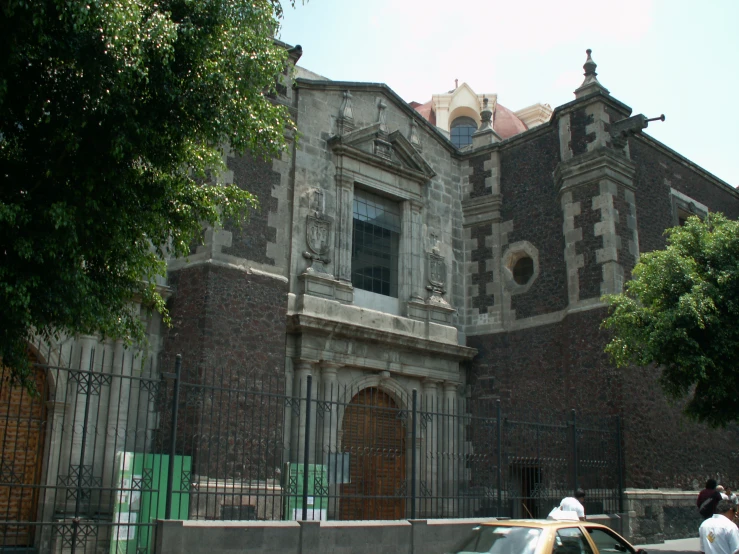 old building with many windows and stone walls