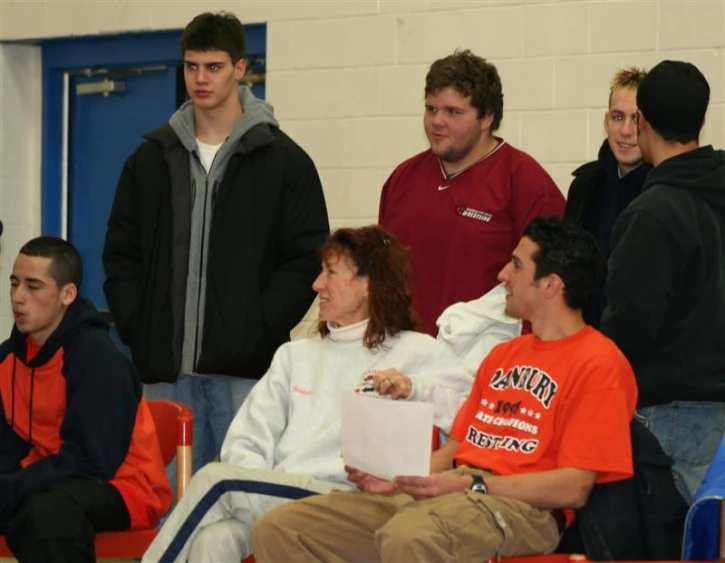 a group of students sitting down in a room