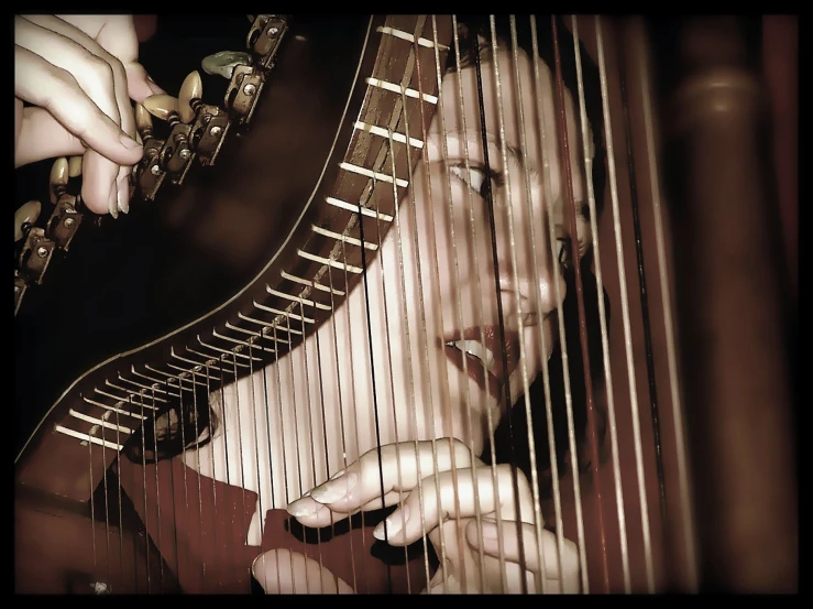 a woman is playing a musical instrument on a table