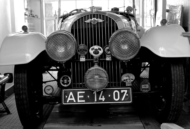 the front grills of an old car on display