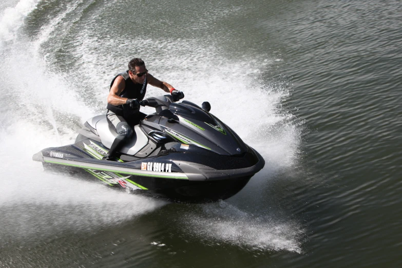 a man is on his jet ski in the water