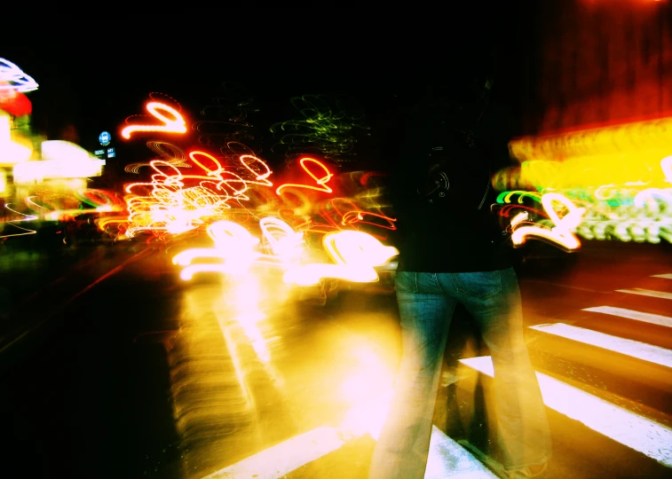 blurry pograph of cars on a city street