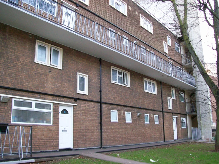 a row of balconies along a brick building