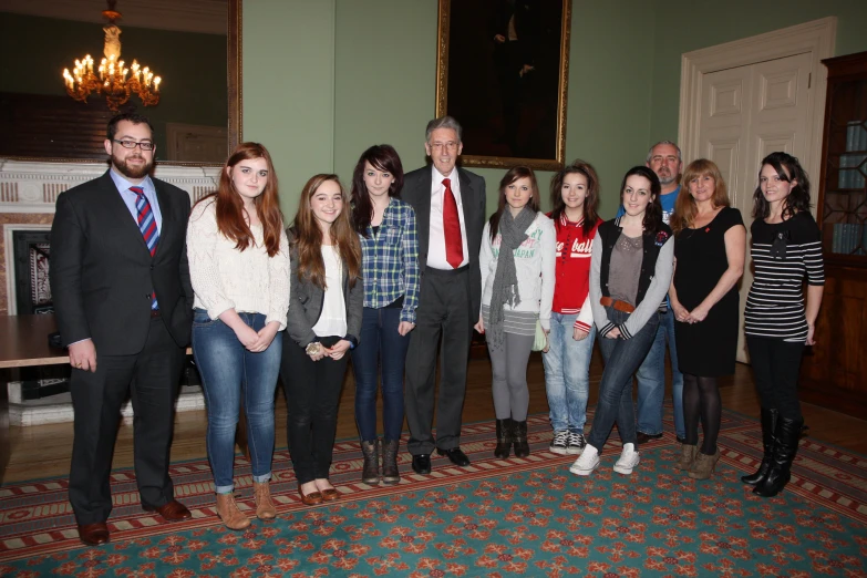 a group of people stand in a room