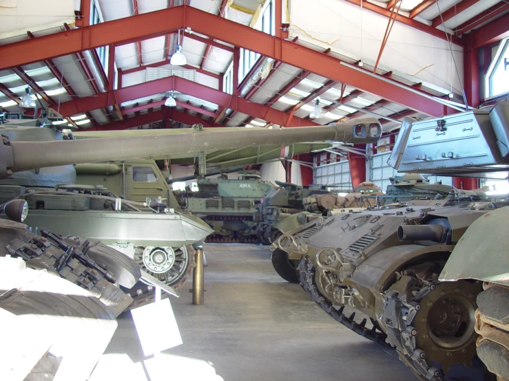 some large tanks are sitting in a building