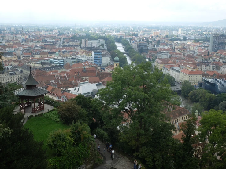 an aerial view shows many buildings and some trees