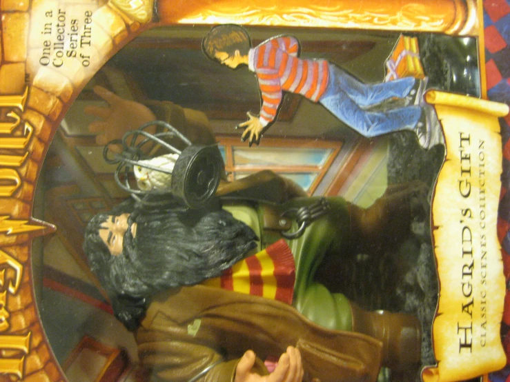the hogsh movie figure, has a wizard and wizard hat on
