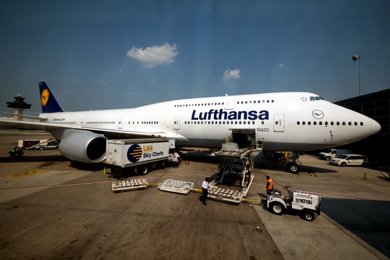 an airplane is sitting in an airport on the tarmac