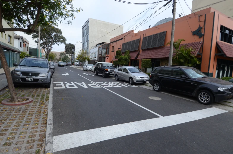 a number of cars on a city street