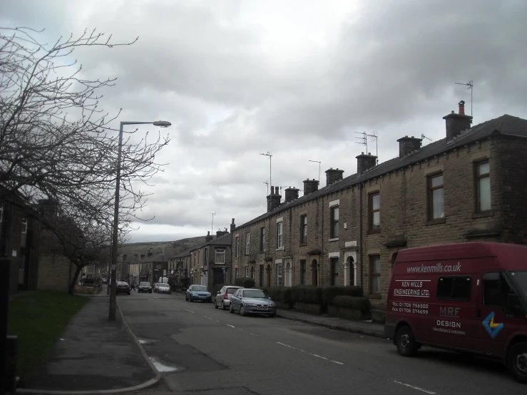 a small city street lined with brick buildings