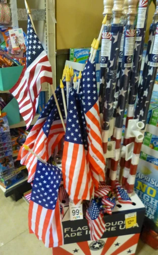 a display of american flag flags in a store